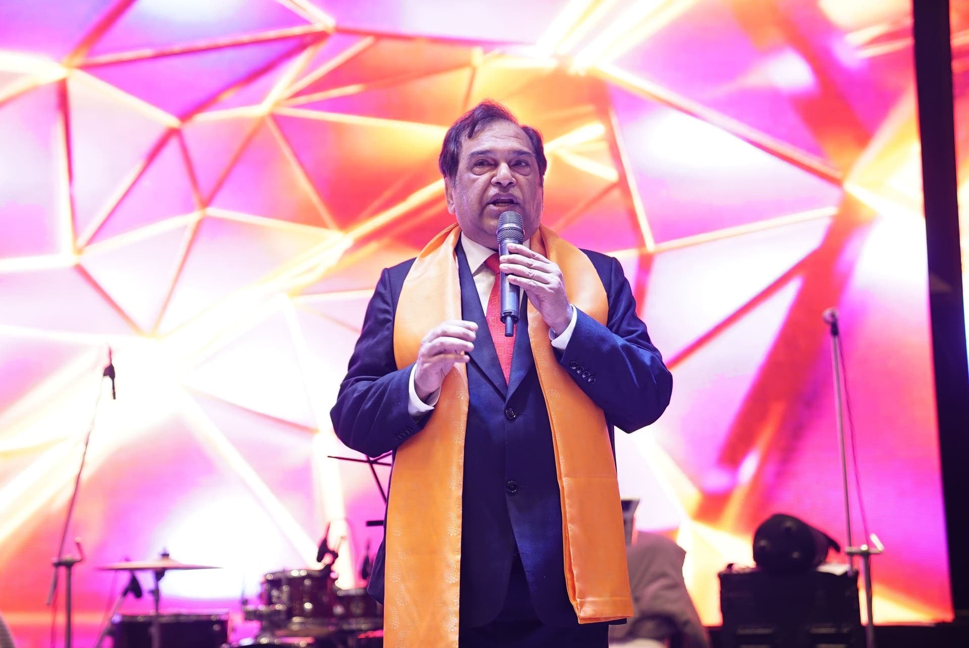 A speaker addresses the audience at the gala night